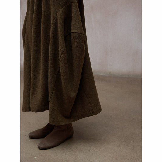 Wool construction fine cut loose silhouette commuter contrasting color lace-up elastic waist skirt