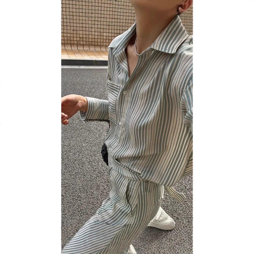 Spring and summer French striped fashion suit women's autumn new long-sleeved shirt + skirt two-piece set